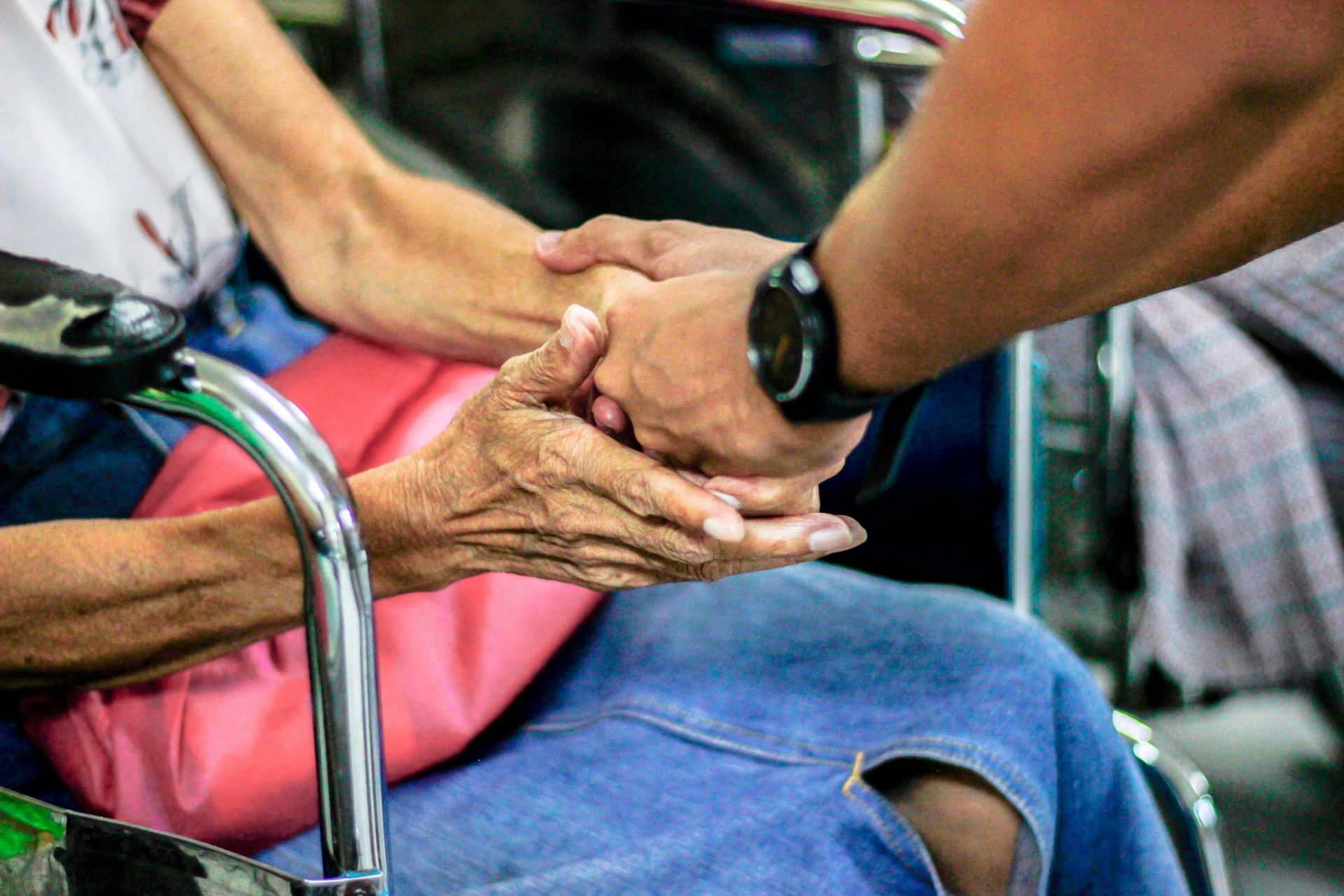 photo of people holding hands