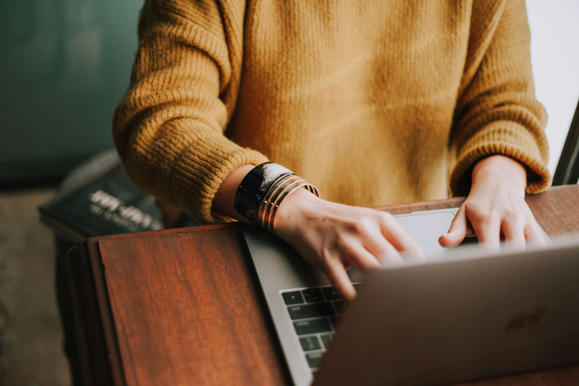 photo of person on a computer