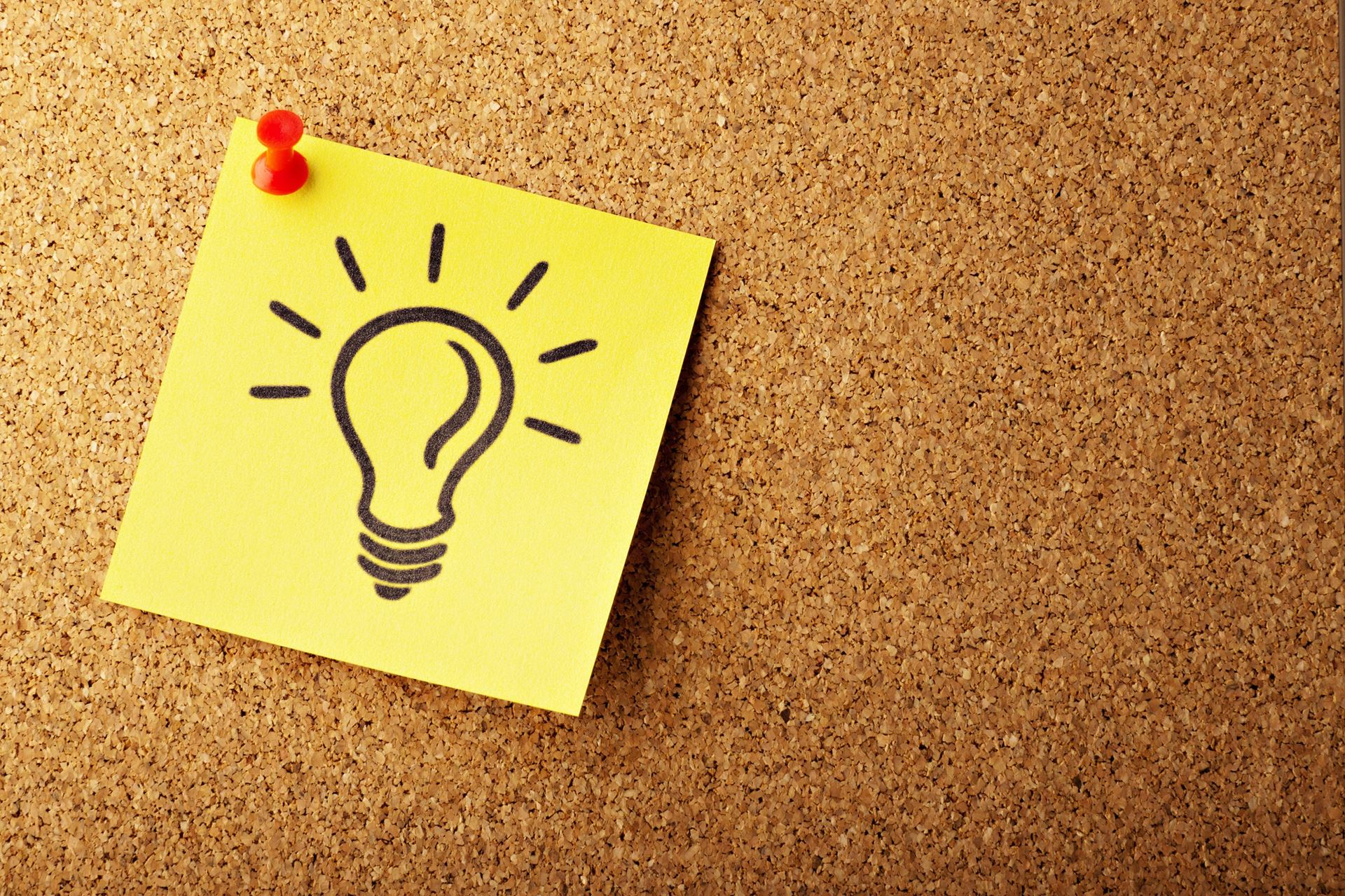 photo of an light bulb on post-it note