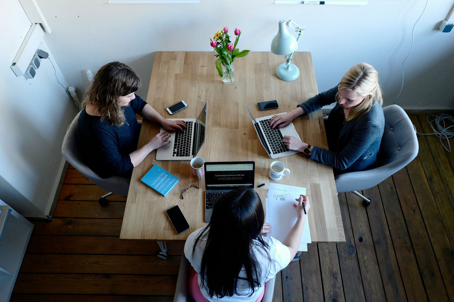 women working on laptop